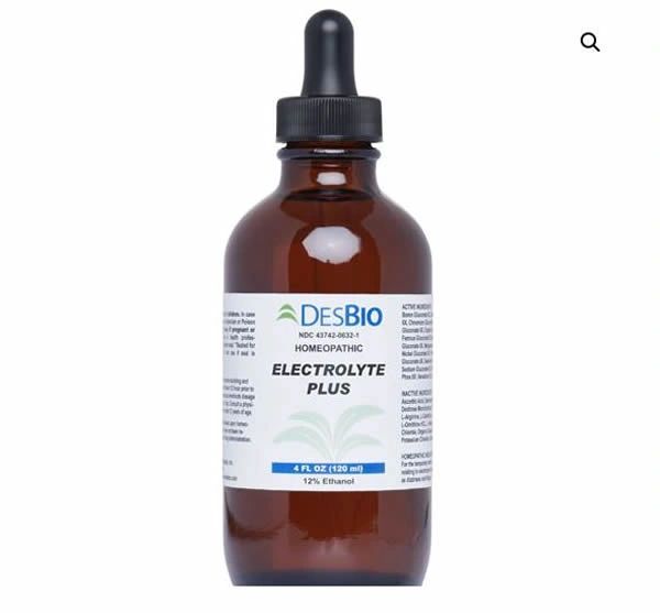 Brown dropper bottle of DesBio Electrolyte Plus supplement on a white background