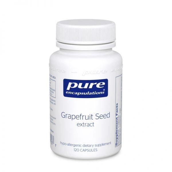 White bottle of Pure Encapsulations Grapefruit Seed Extract supplement on a plain background