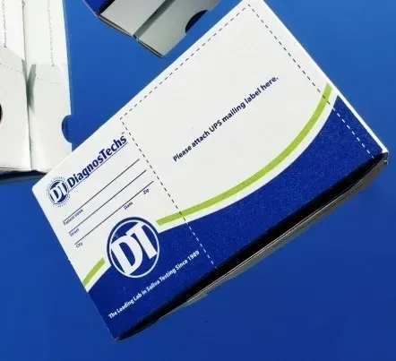 Blue-and-white Diamentes box with logo, tilted on a blue surface
