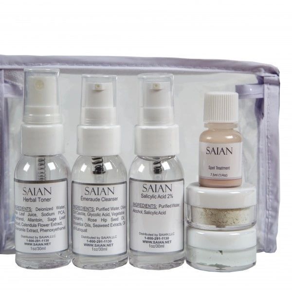 SAIAN skincare set in a clear pouch with four white bottles and jars on a white background