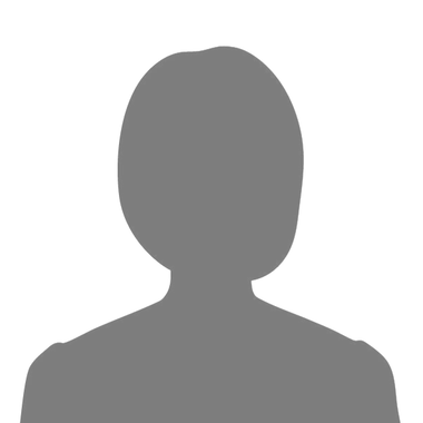 Silhouette of a person with short hair and broad shoulders, against a white background.