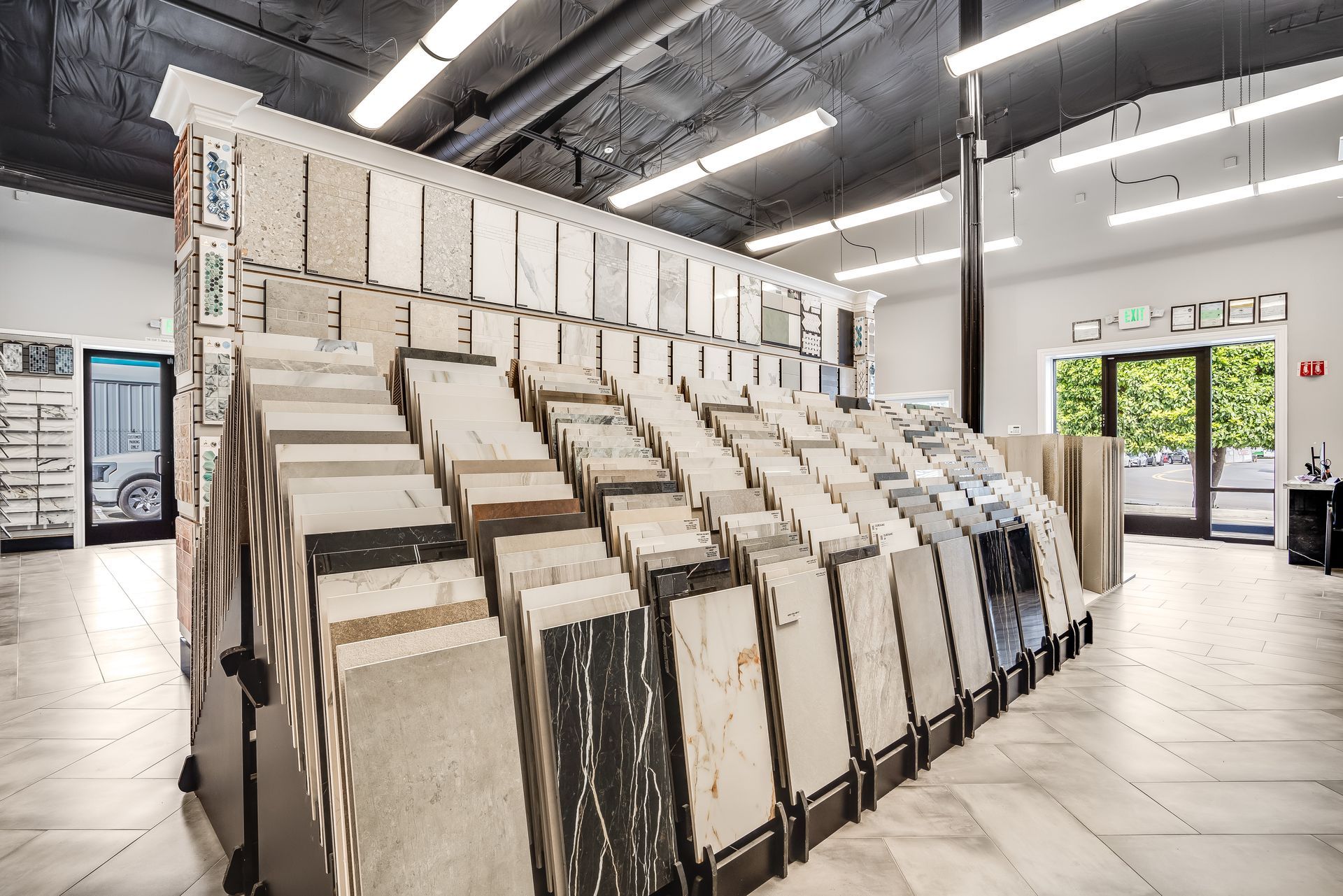 There are many different types of tiles on display in this store.
