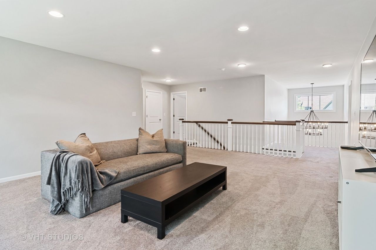 There is a couch and a coffee table in the living room.