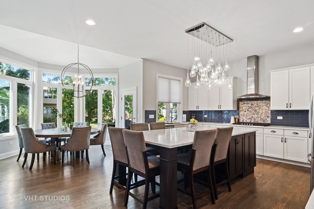 There is a large island in the middle of the kitchen.
