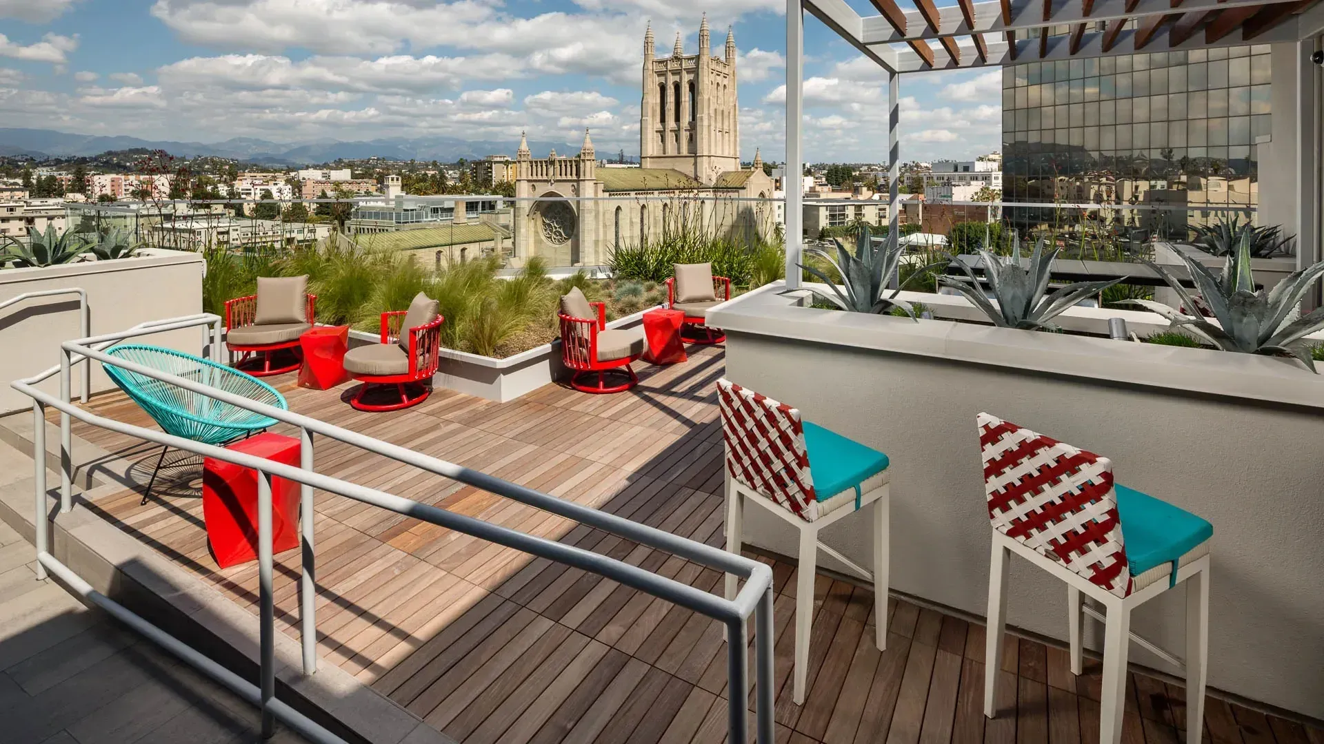 Rooftop terrace with seating and city views at Next on Sixth Los Angeles