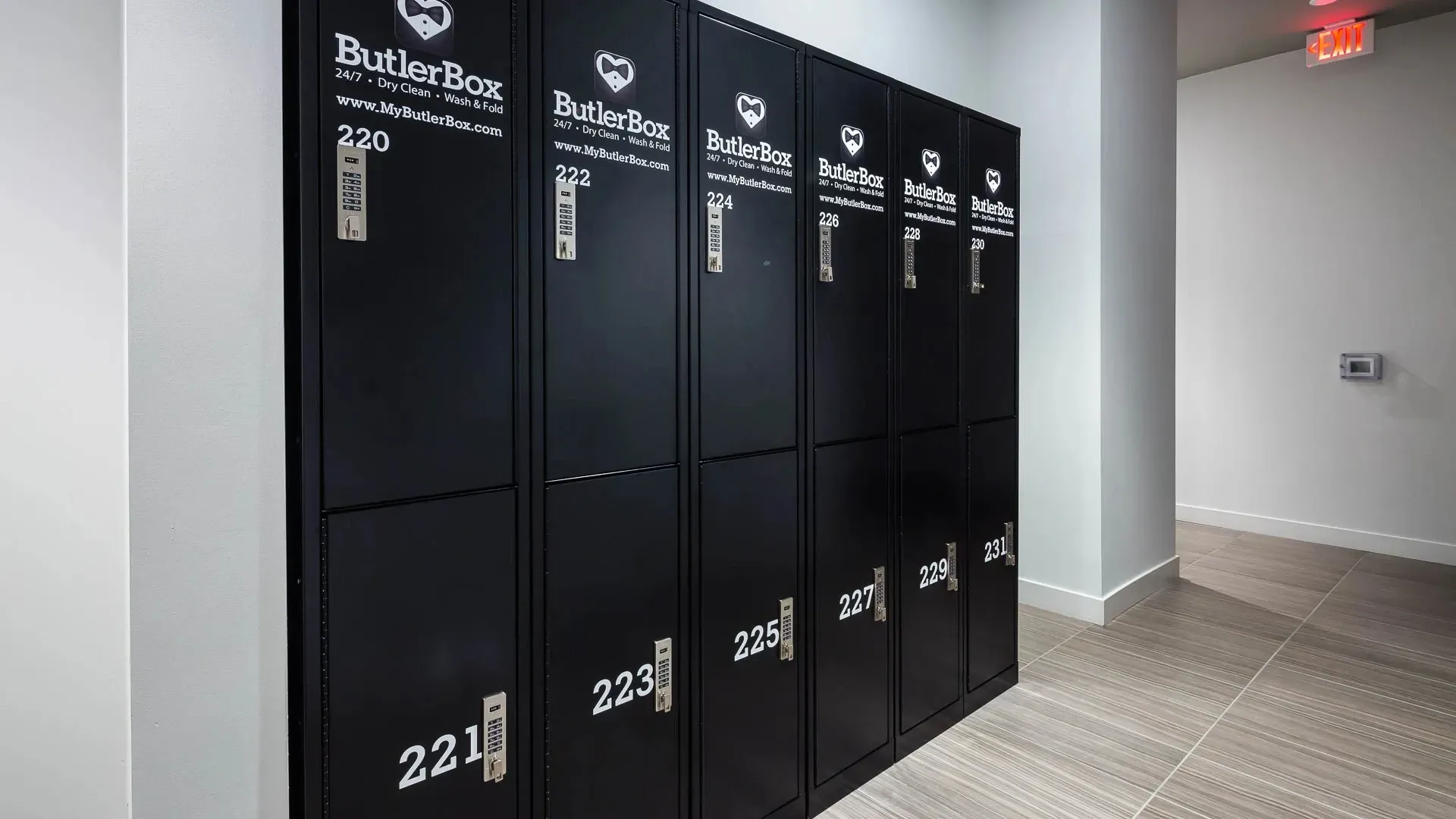 ButlerBox 24/7 Dry Clean, Wash & Fold lockers numbered 220-231 at Next on Sixth Los Angeles
