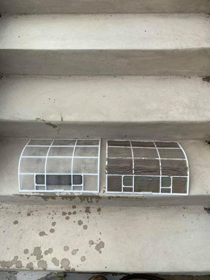 Person Cleaning an Ac Unit With a Pressure Washer — Airset Air Conditioning in Bellingen, NSW