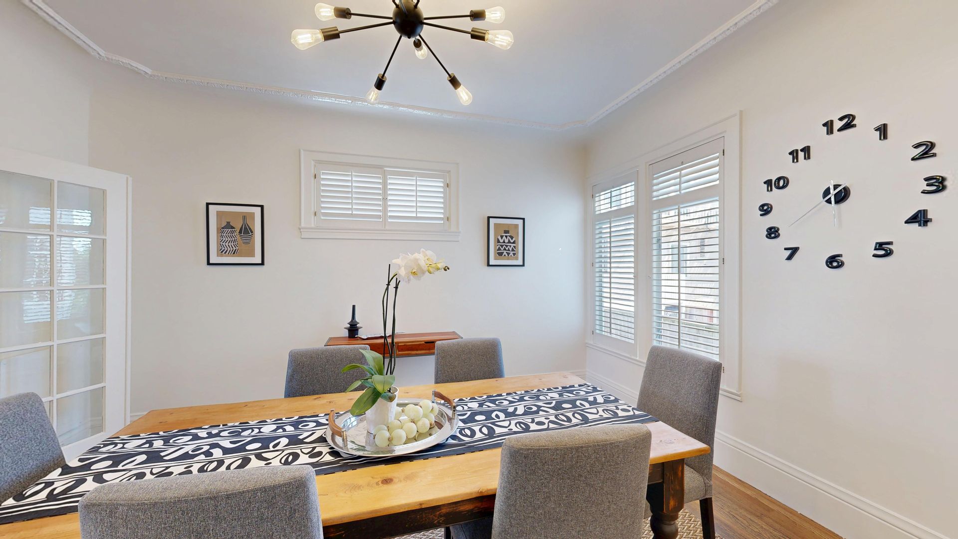 dining room clock window and sideboard