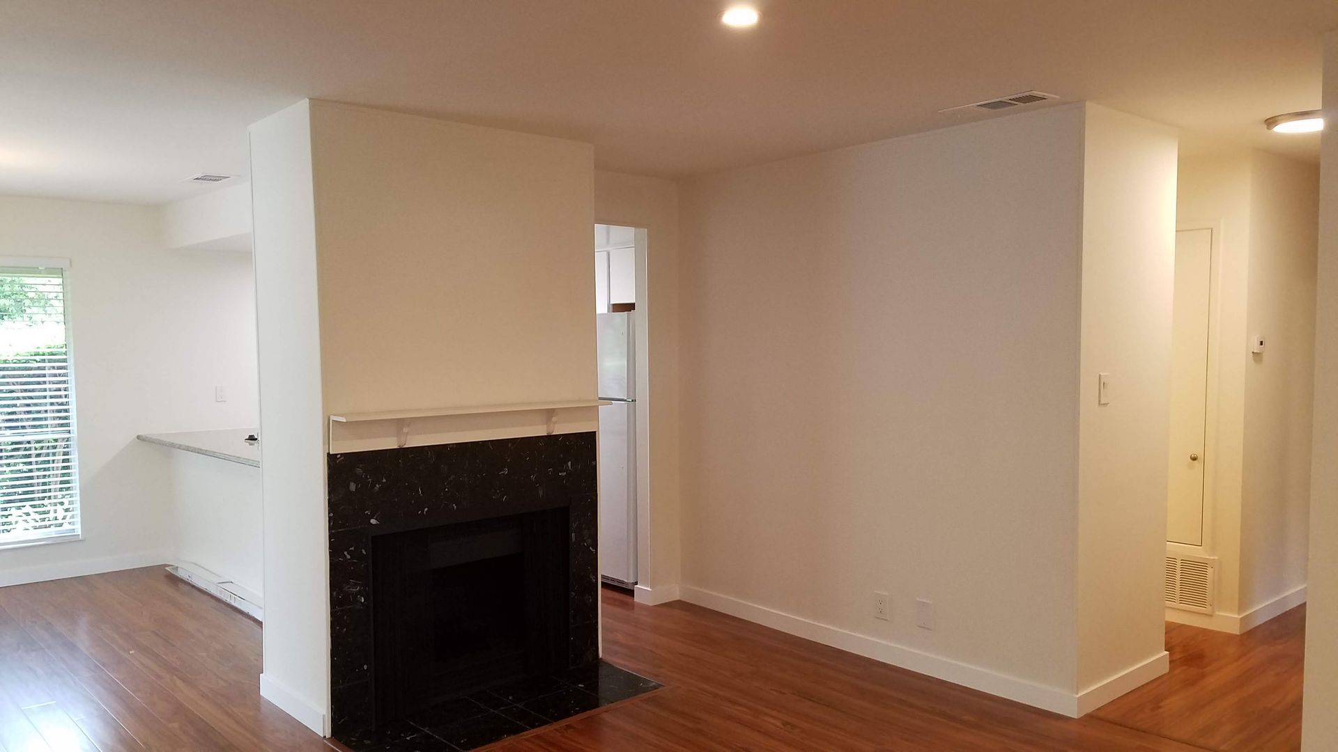 living area view to kitchen
