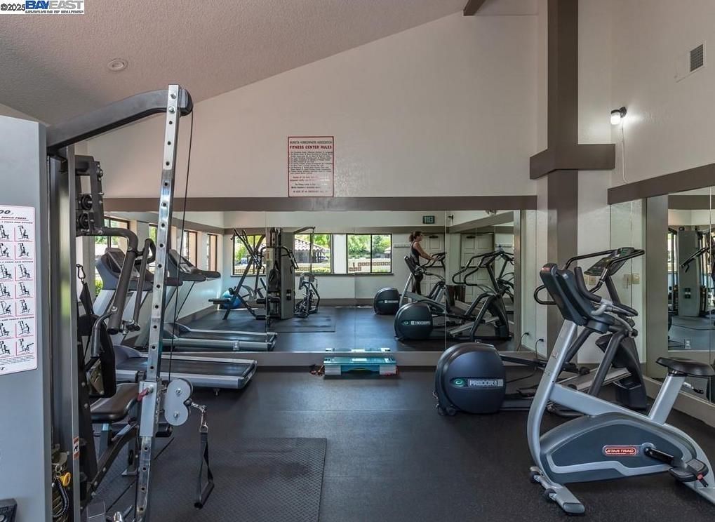 A large gym with a lot of exercise equipment