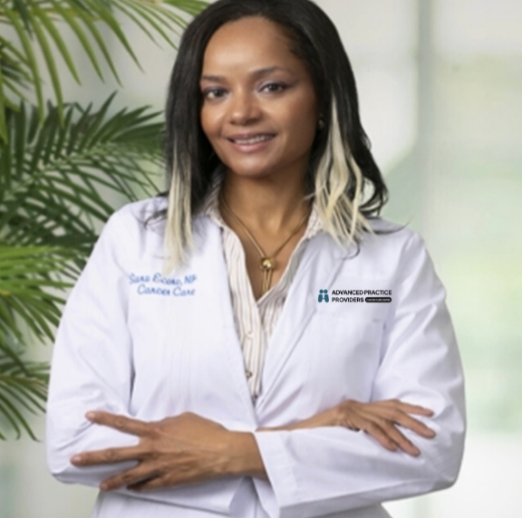 Woman in white lab coat with crossed arms; 