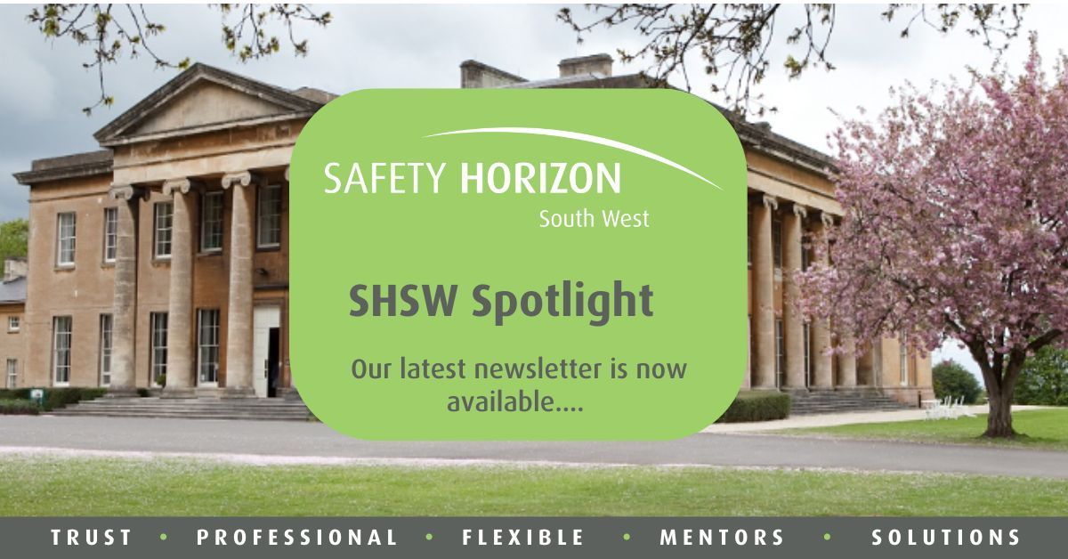 A large building with a green sign that says safety horizon