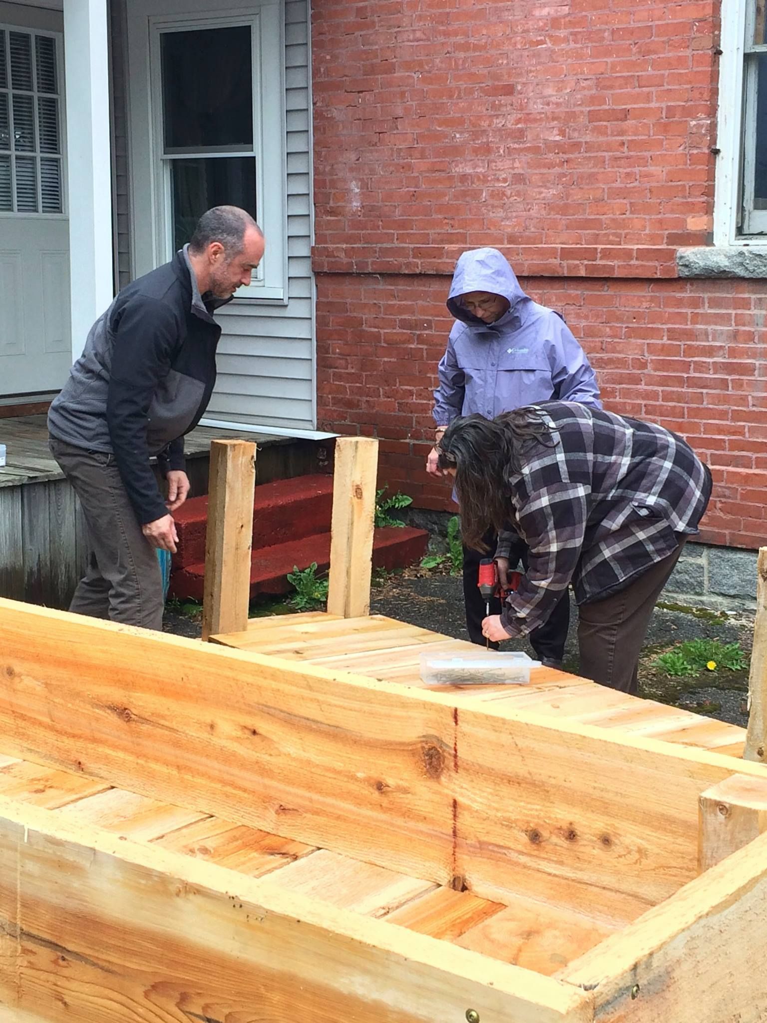 Community Restorative Justice Center: volunteers building a box