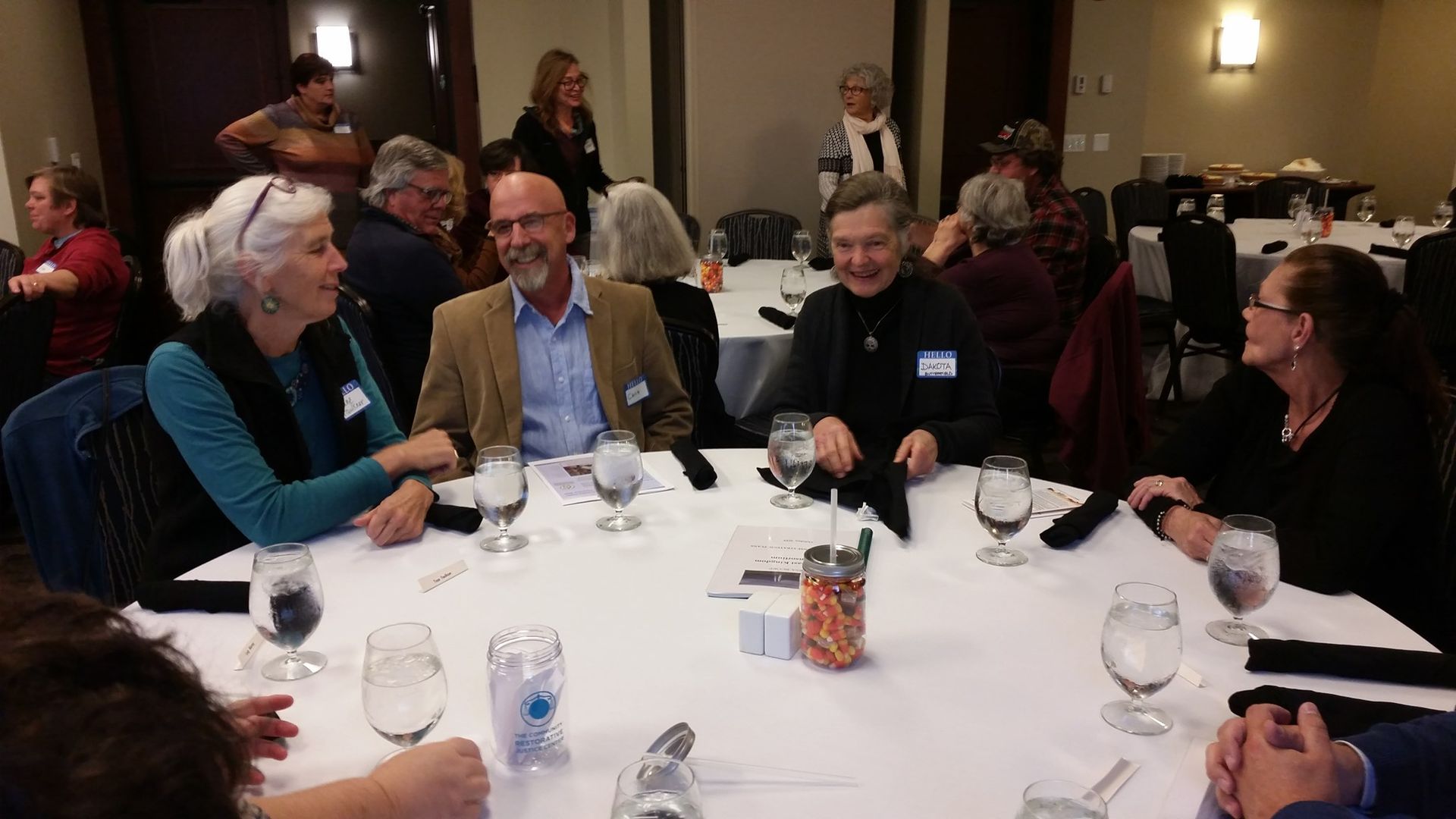 Community Restorative Justice Center: group of people at a dinner meeting