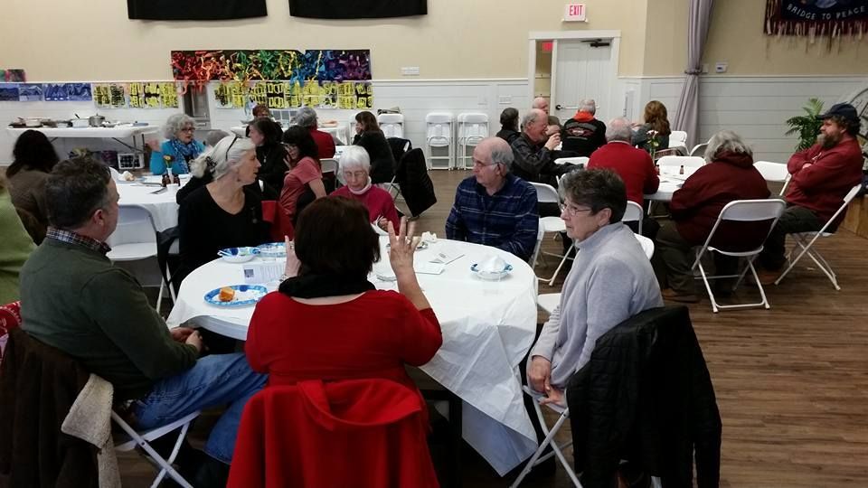 Community Restorative Justice Center: a group of people attending a banquet