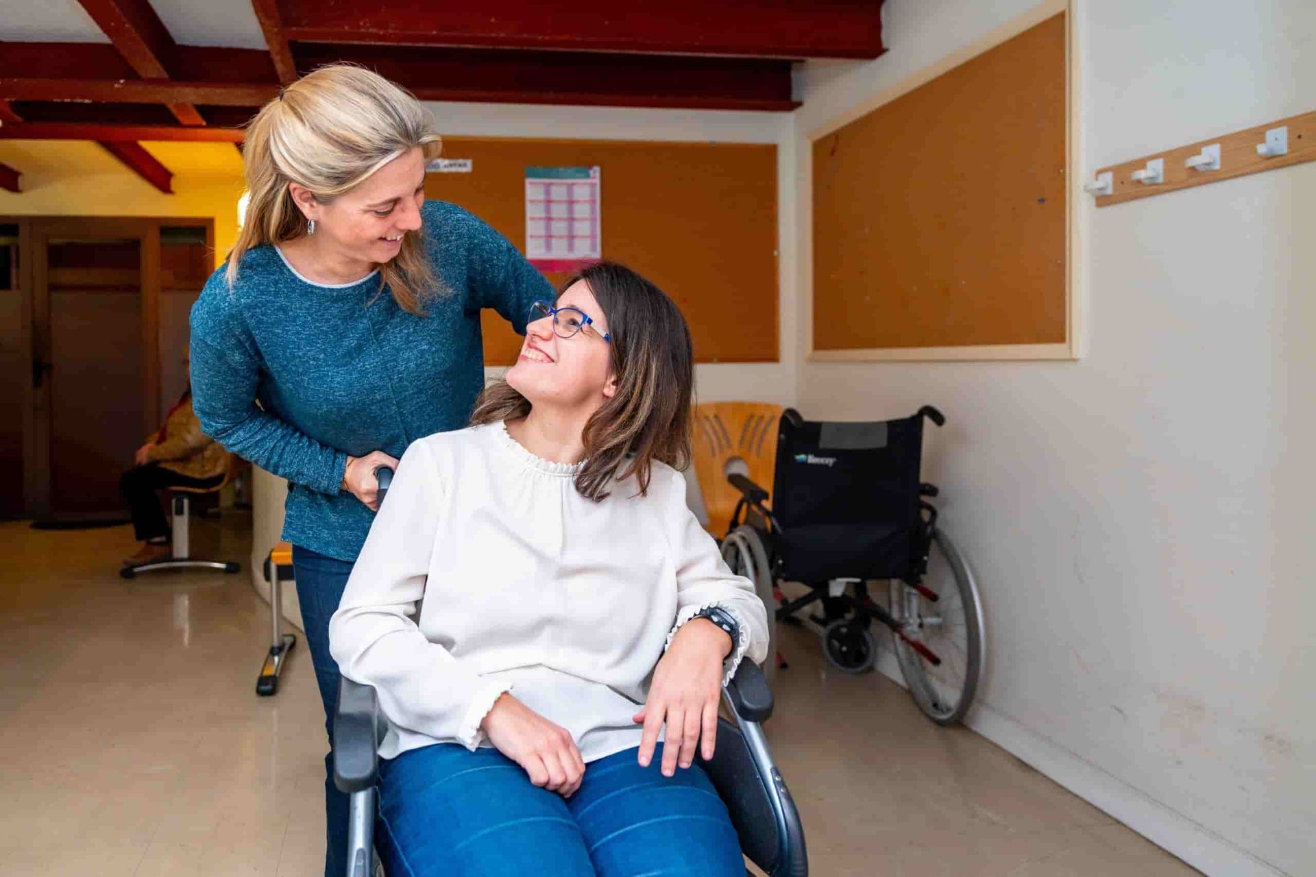 A Woman Talking To A Person On A Wheelchair About Career Planning — Adaptive Care Pty Ltd In Sunshine, VIC