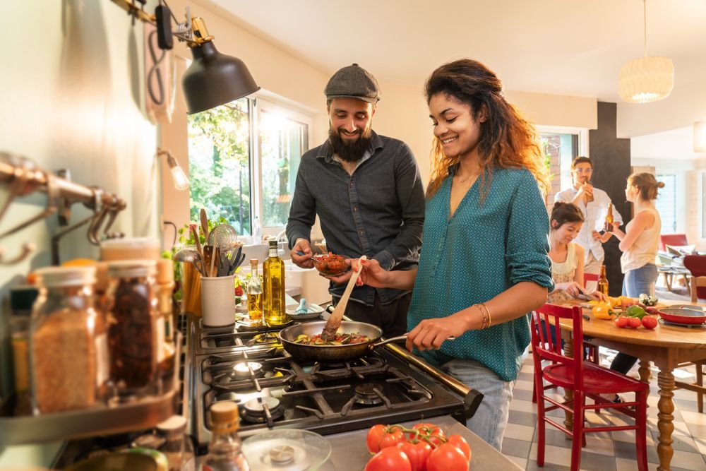 Couple Hosting Holiday Dinner ©Jack Frog