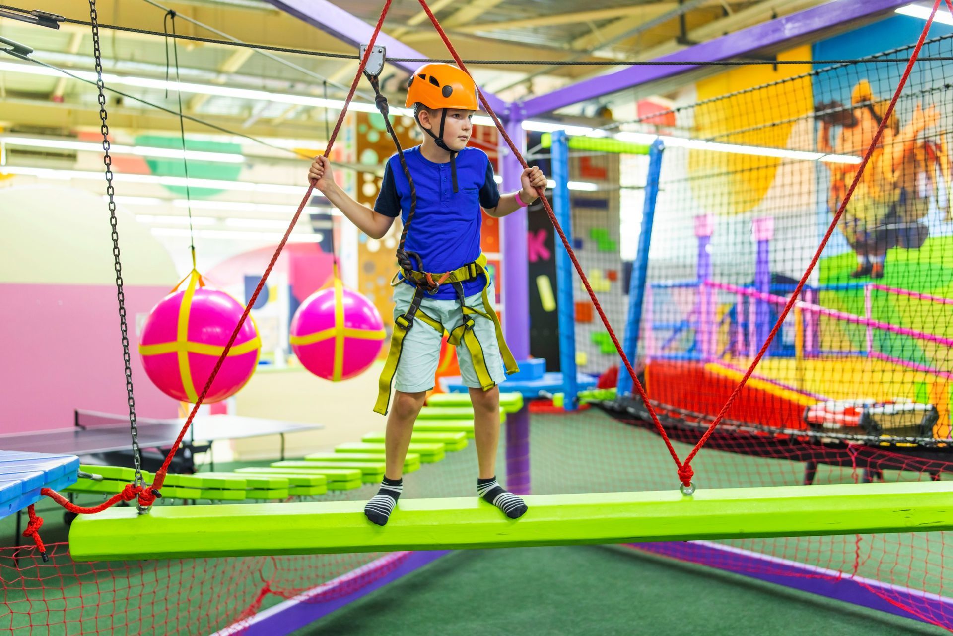 Kid on a course at Urban Air Adventure Park