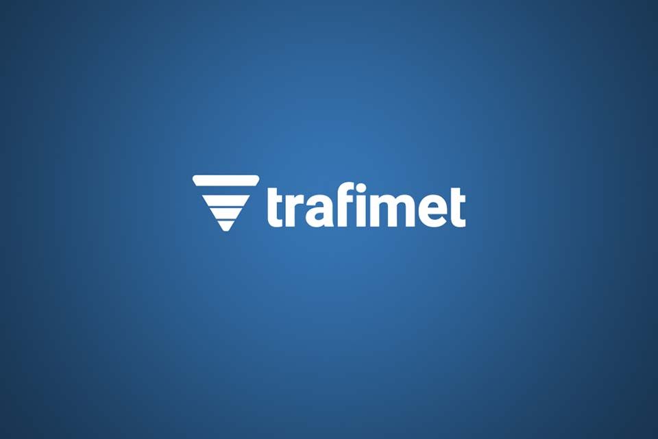 Logo di Trafimet in bianco su sfondo sfumato blu.
