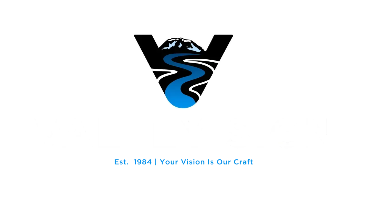 Black-and-blue V-shaped logo with a winding road, above the slogan “Est. 1864 | Your Vision Is Our Craft”