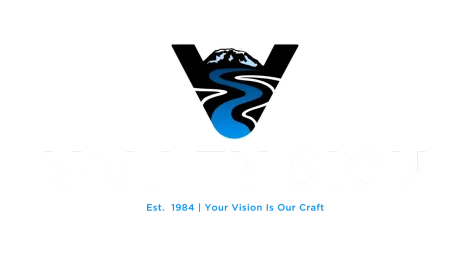 Black-and-blue V-shaped logo with a winding road, above the slogan “Est. 1864 | Your Vision Is Our Craft”