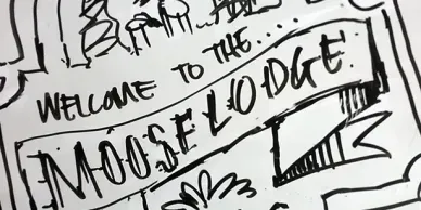 Black-and-white hand-drawn sign reading “WELCOME TO THE IMPOSSIBLE LODGE!” with an arrow pointing right