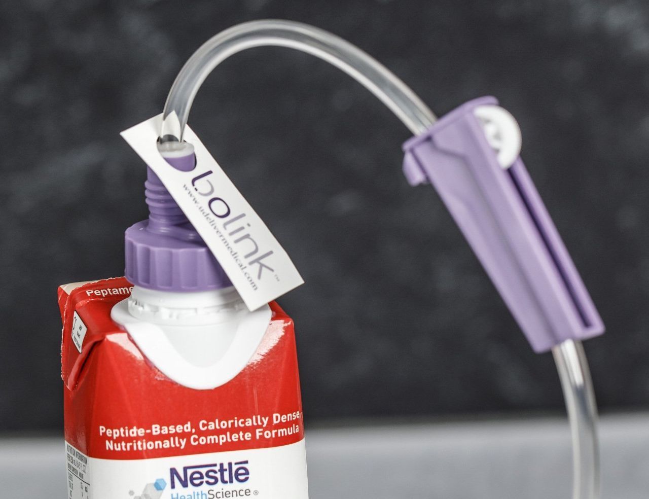 Bolink D Cap attached to Peptamen carton