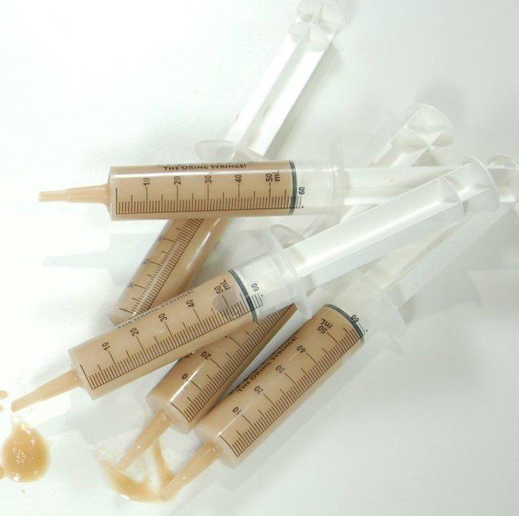 Five messy bolus syringes