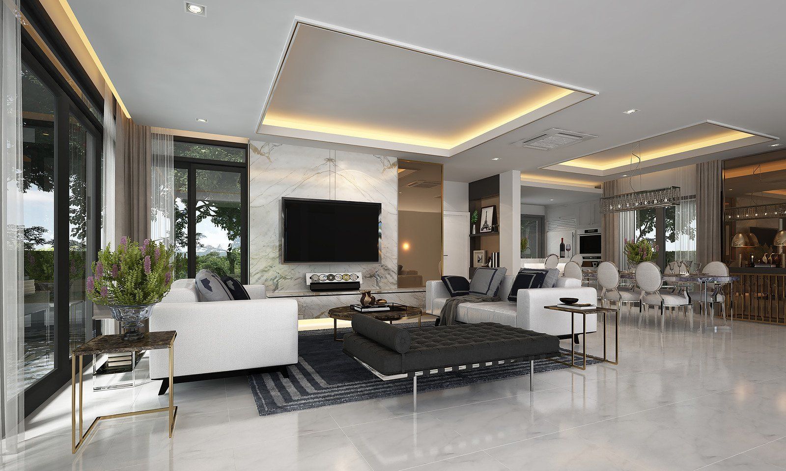 Modern living room with white sofas, marble wall, and large TV, and open to outdoor view.