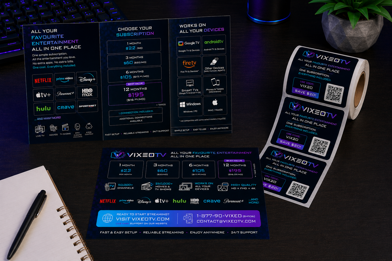 Tri-fold brochure, single page flyer and sticker roll displayed on a desk