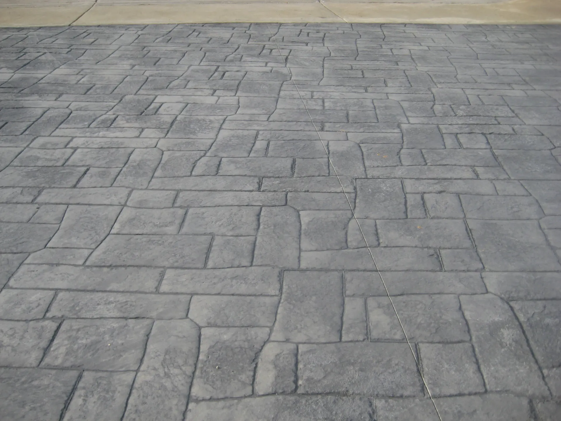 Superior Concrete Construction decorative stamped concrete driveway design
