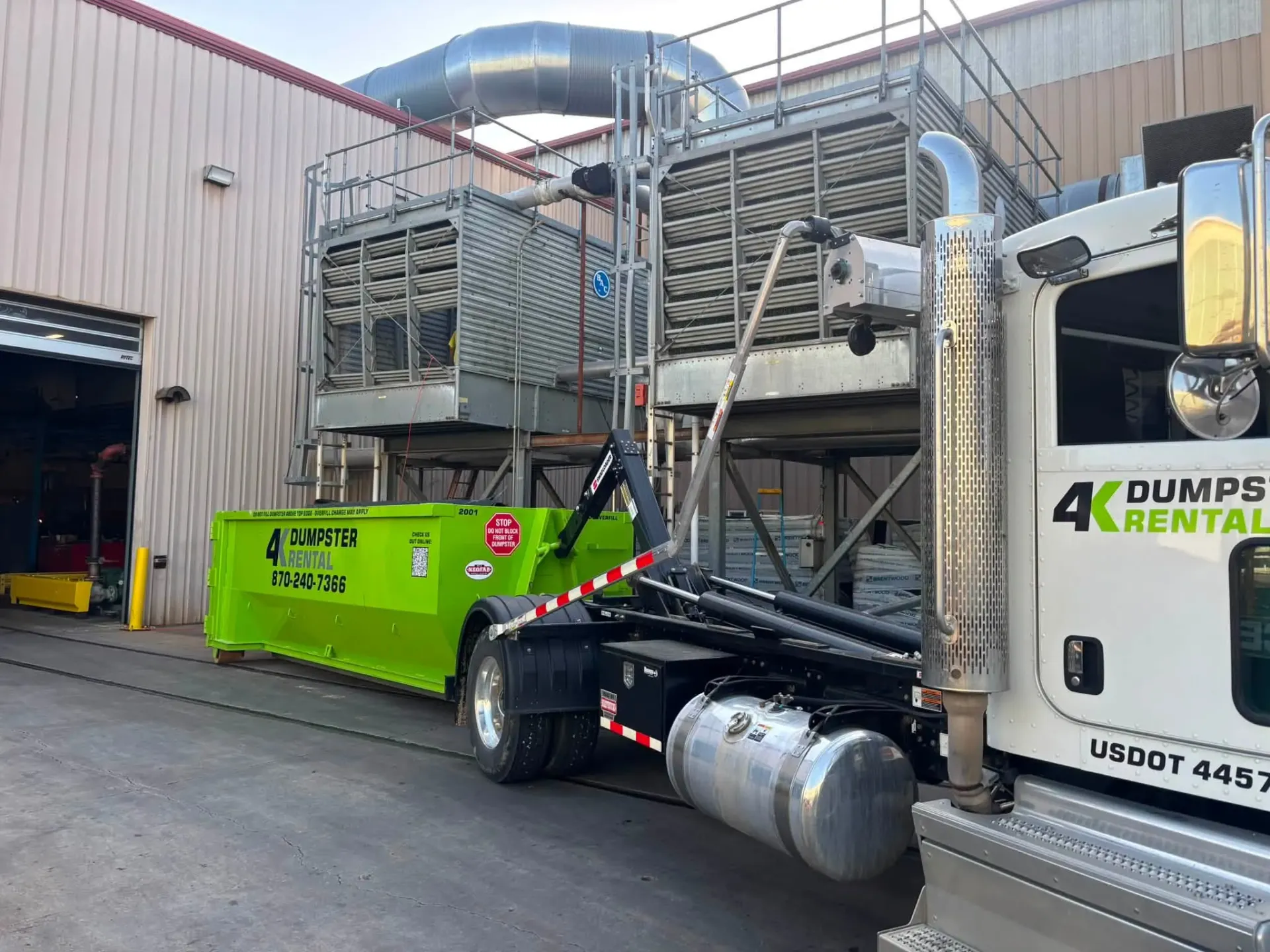 4K Dumpster Rental commercial roll-off dumpster at a business in Northeast Arkansas
