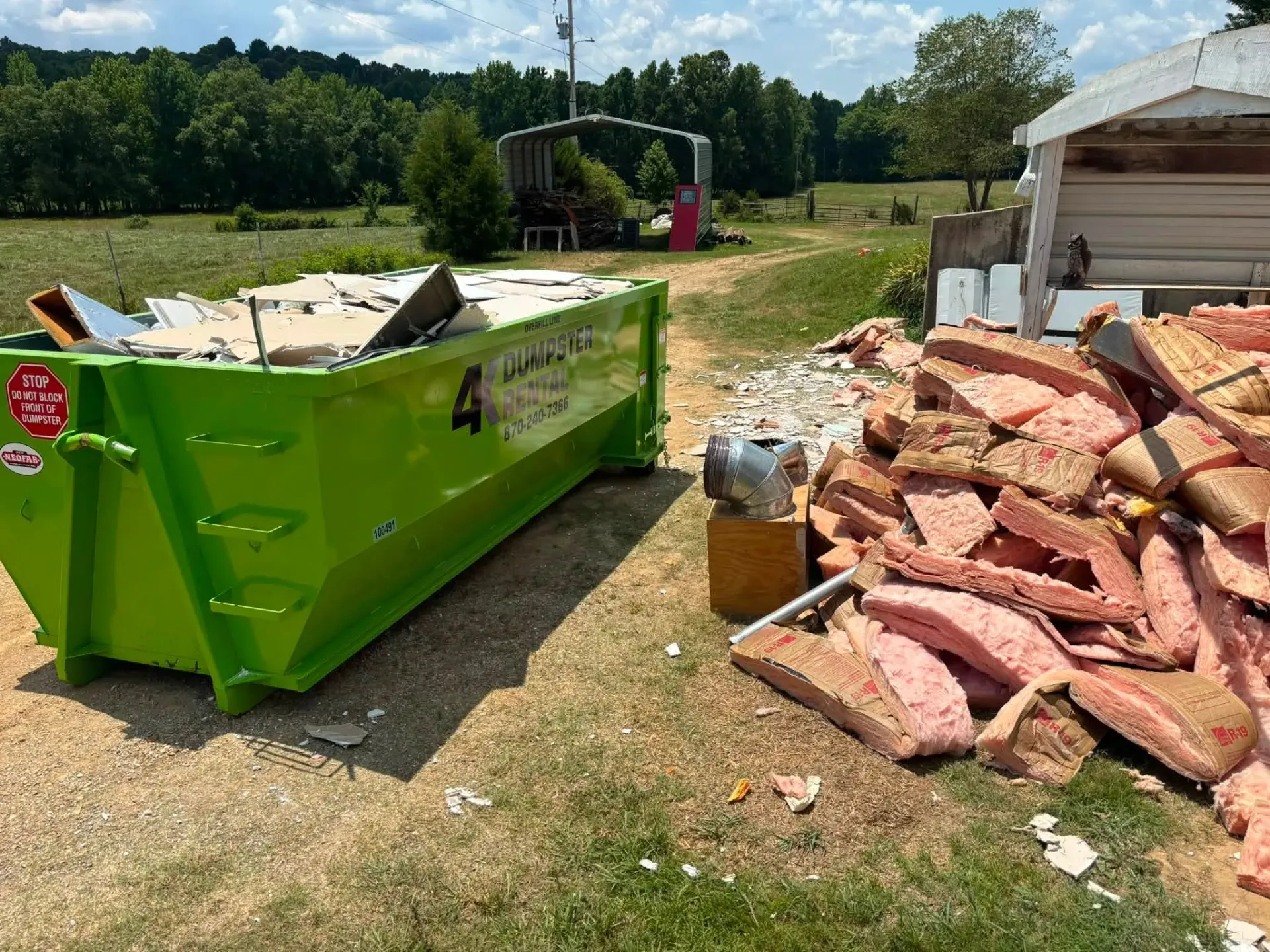 4K Dumpster Rental demolition dumpster on a teardown site in Northeast Arkansas