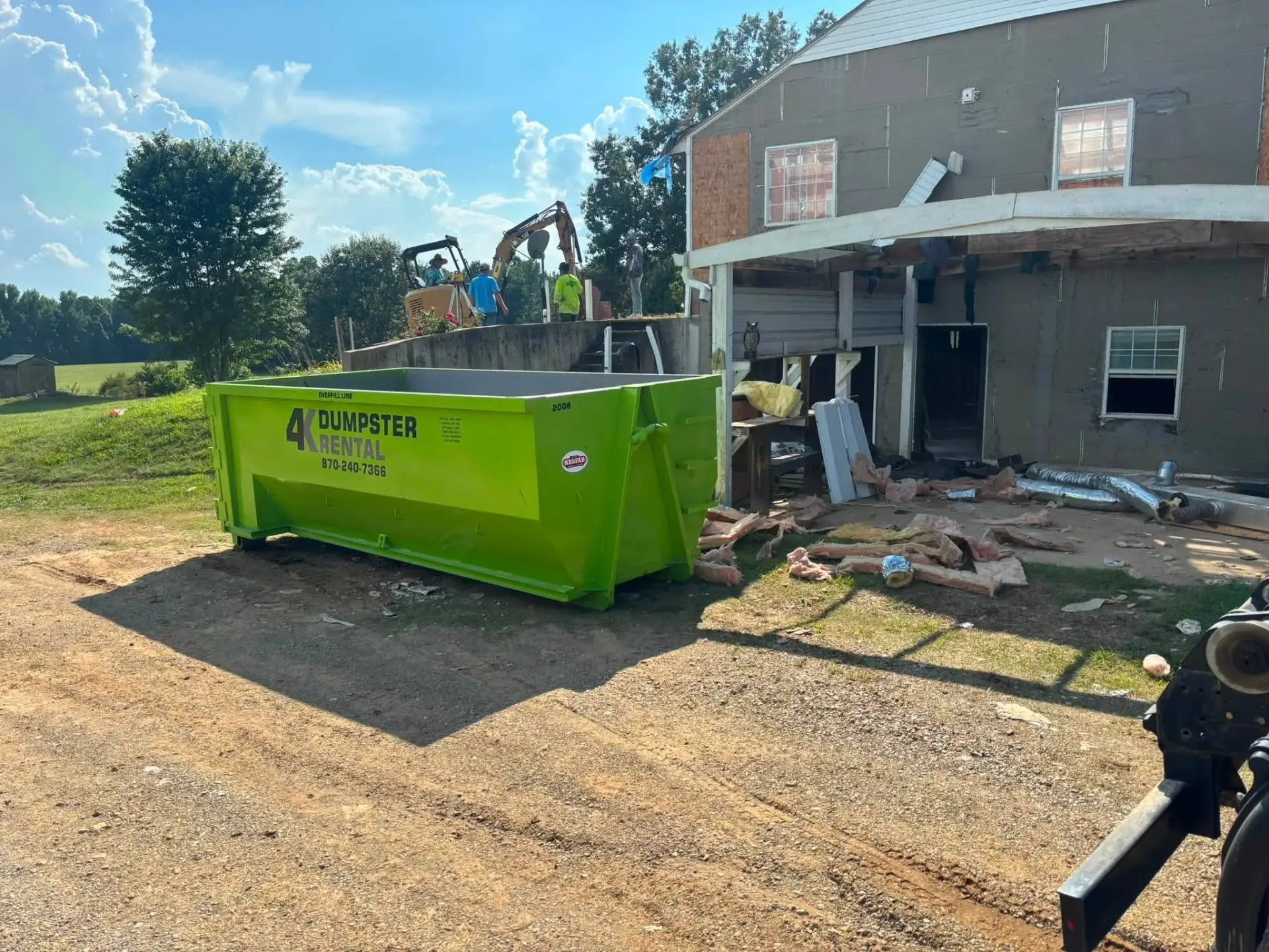 4K Dumpster Rental delivering a demolition dumpster in Northeast Arkansas