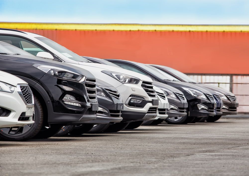 A Row of Cars Are Parked Next to Each Other in a Parking Lot — Motortorque Automotive in South Grafton, NSW