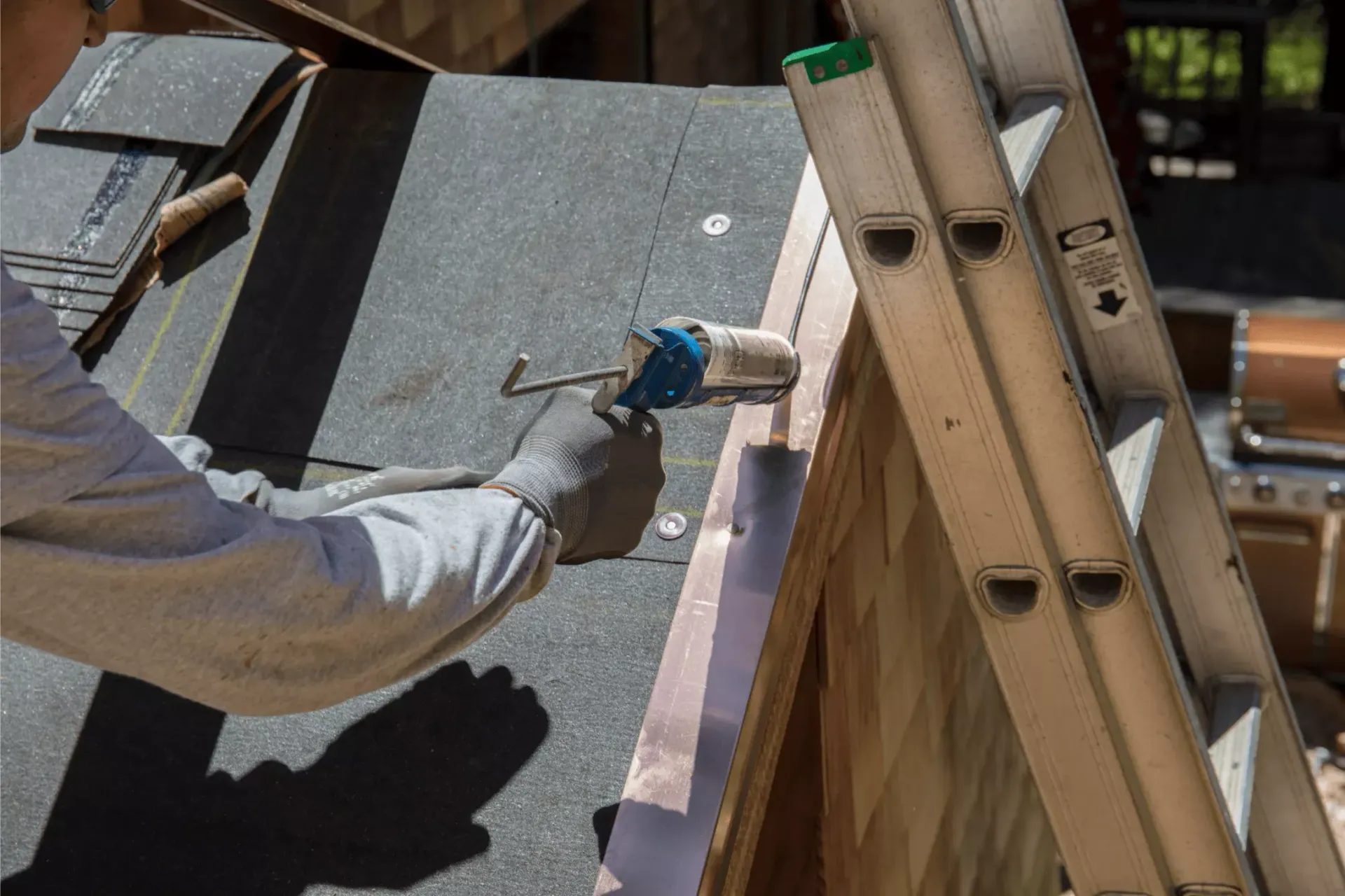 Roofer installing roof flashing during a replacement in Havre de Grace, MD