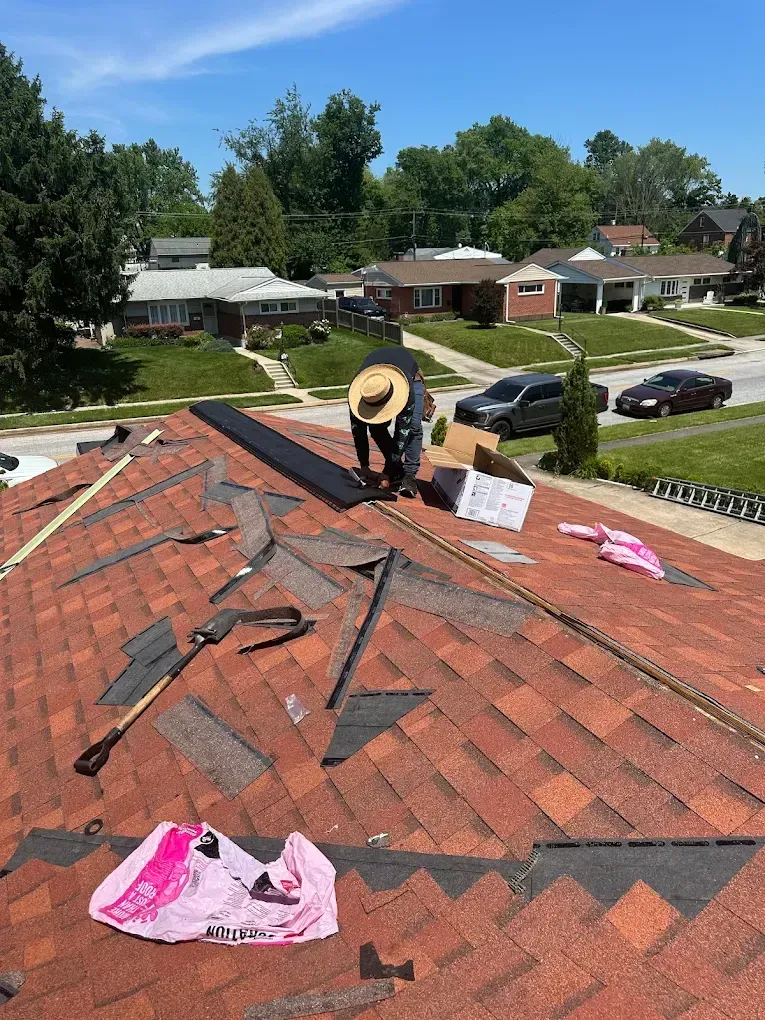 Quantum Roofing & Restoration crew arriving for a roof repair on a Havre de Grace, MD home