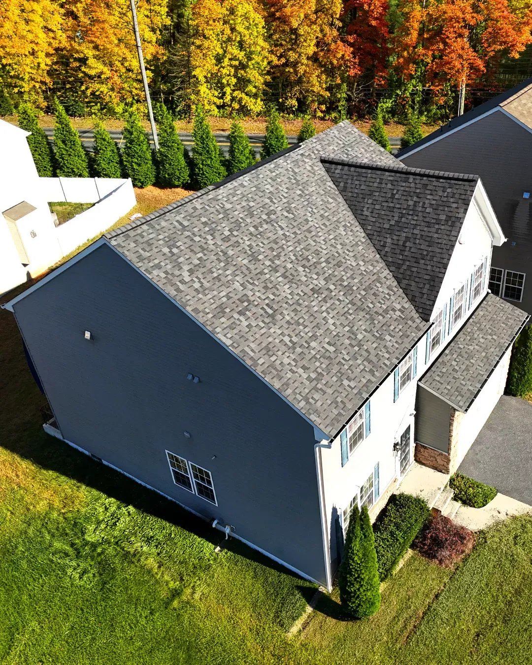 Quantum Roofing & Restoration crew installing underlayment during a roof replacement in Maryland