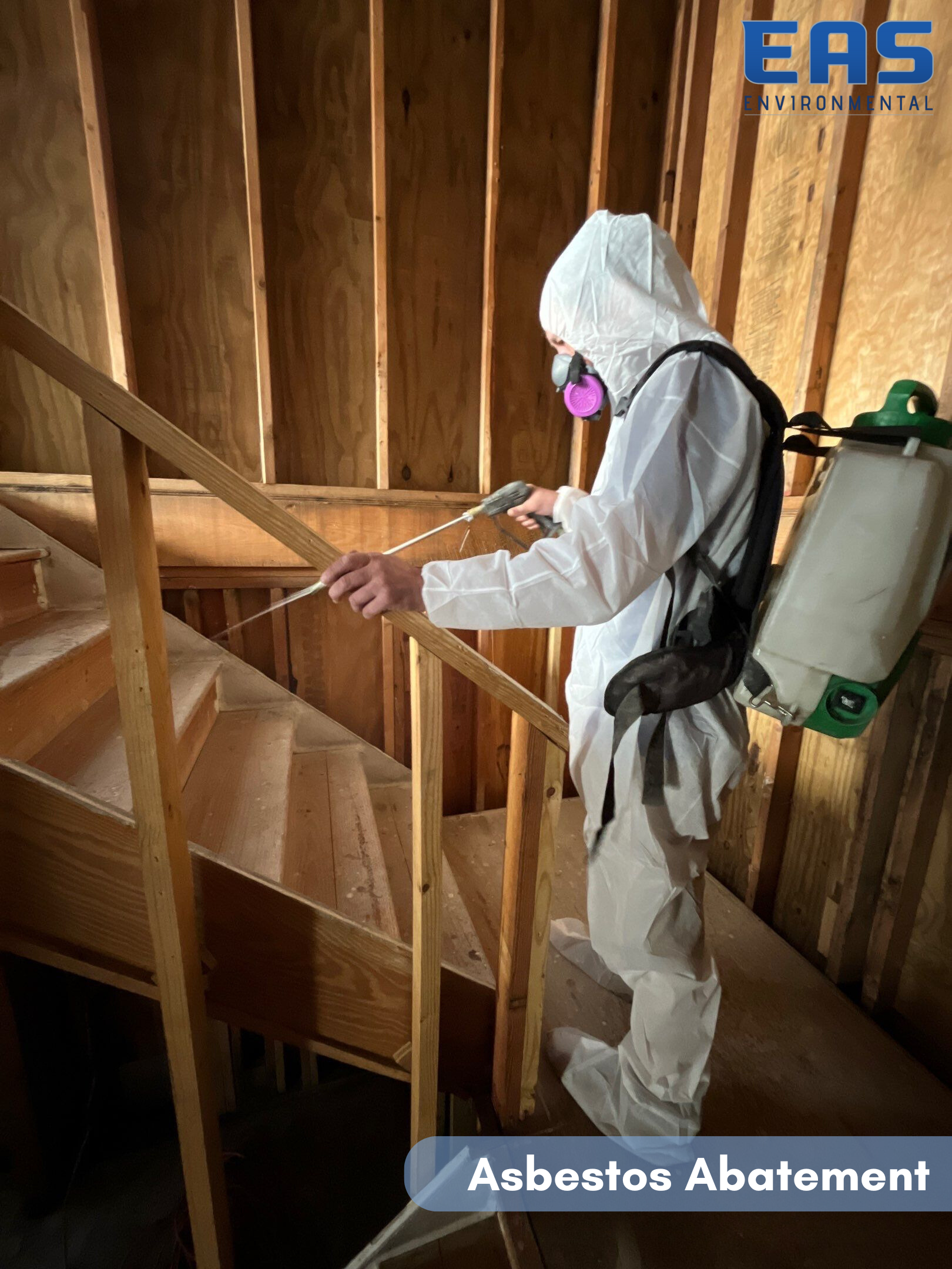 Person in protective suit spraying a staircase, labeled