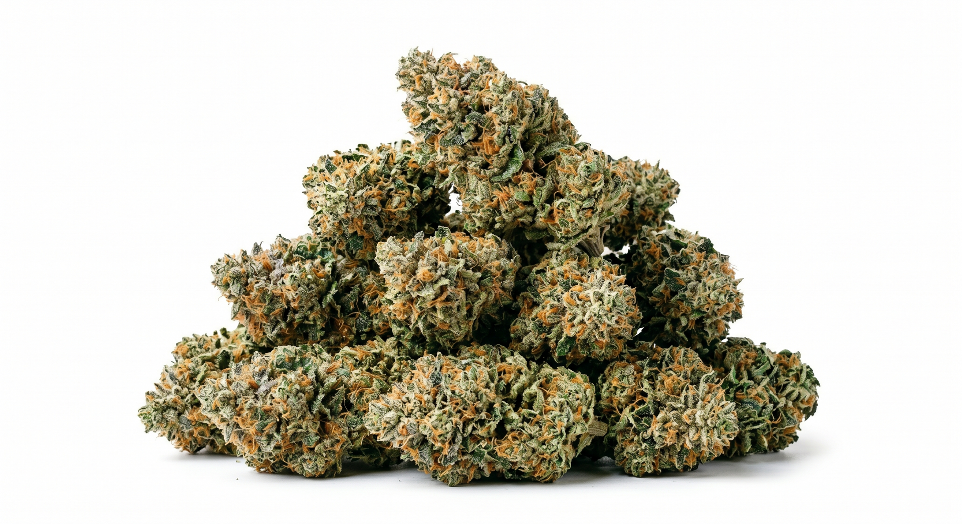 A pile of green cannabis buds on a white background