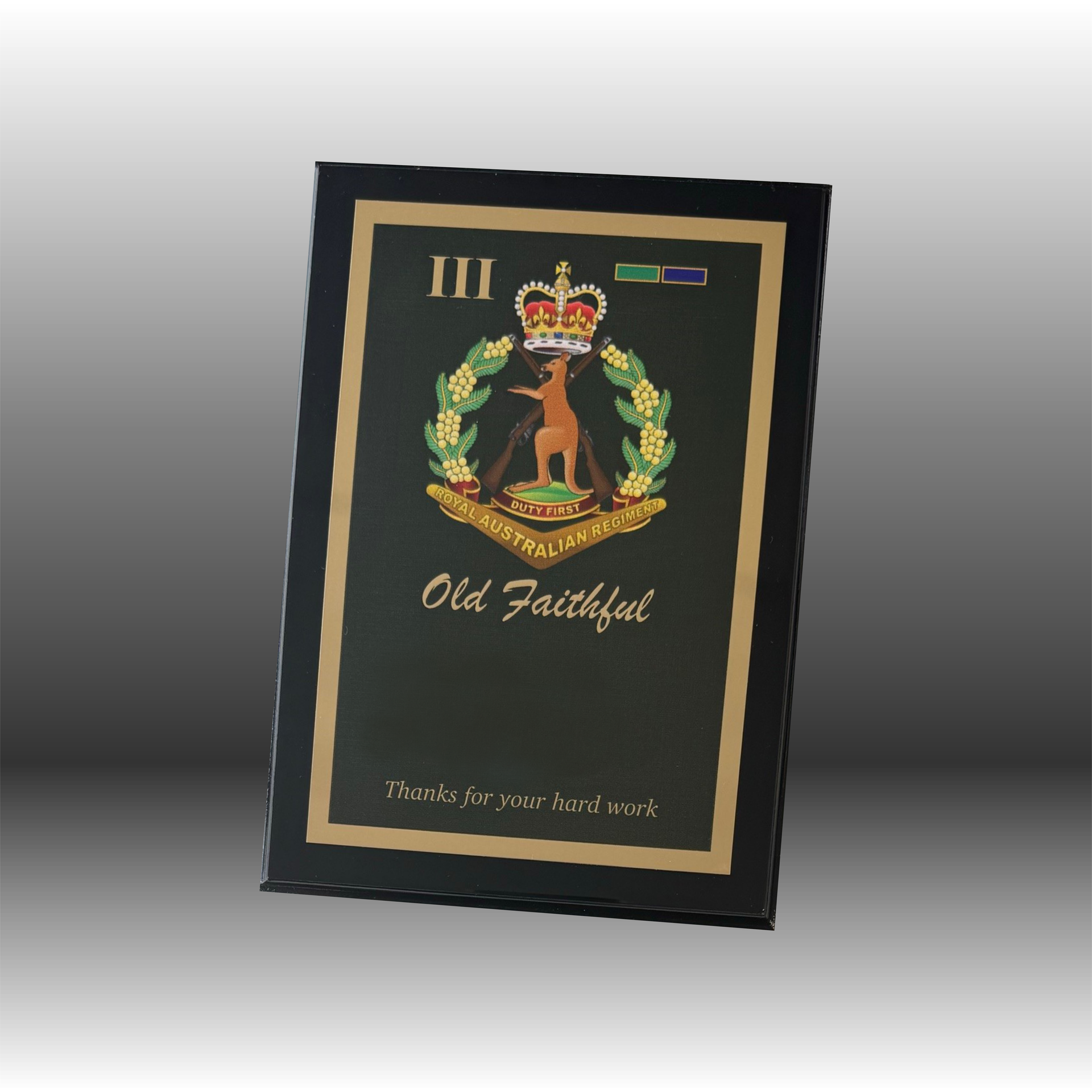 Various awards and desk accessories, including a silver tray, clock, and engraved plaques — NQ Plaques & Trophies In Mount Isa, QLD