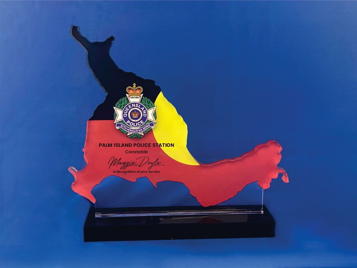 Various awards and desk accessories, including a silver tray, clock, and engraved plaques — NQ Plaques & Trophies In Mount Isa, QLD
