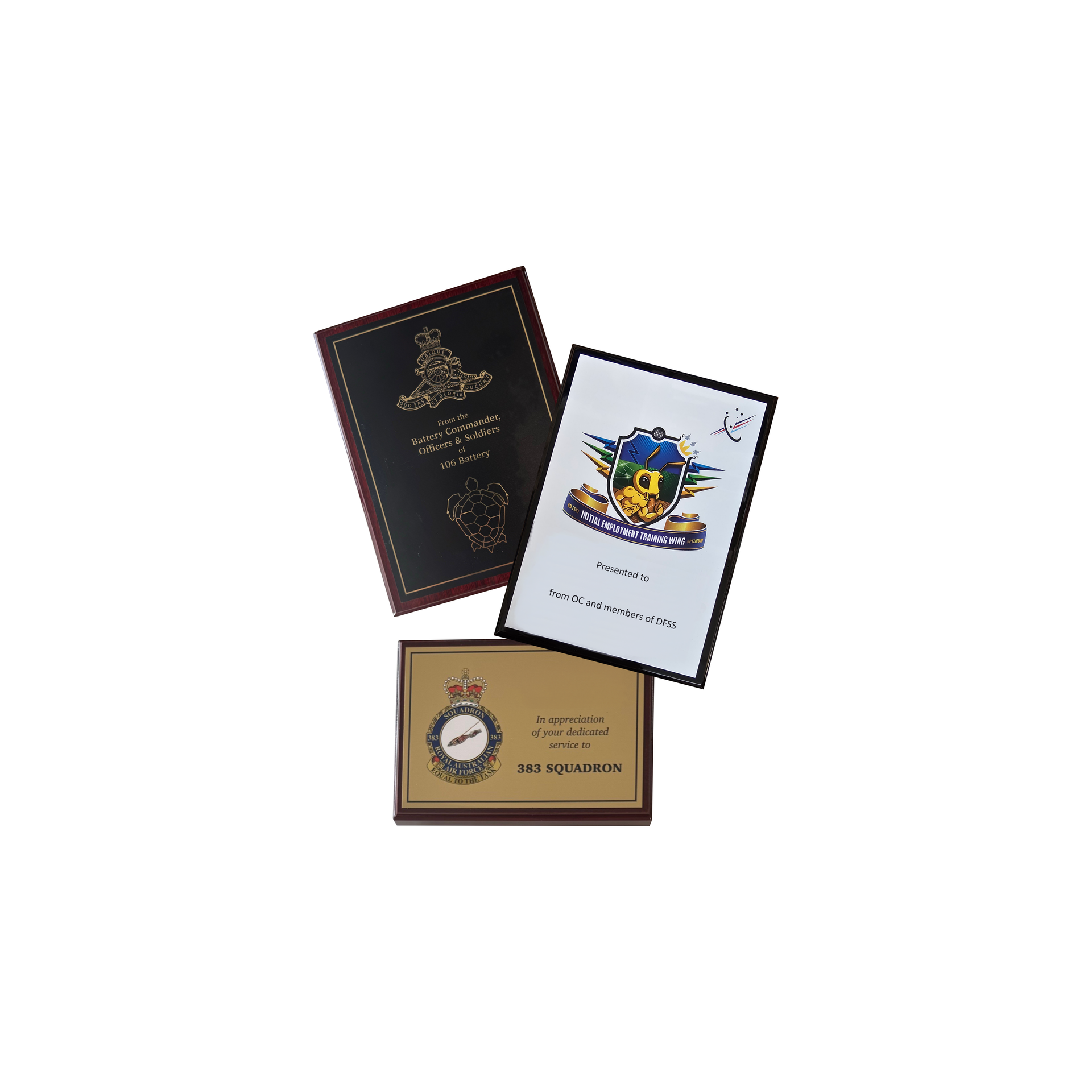 Various awards and desk accessories, including a silver tray, clock, and engraved plaques — NQ Plaques & Trophies In Mount Isa, QLD