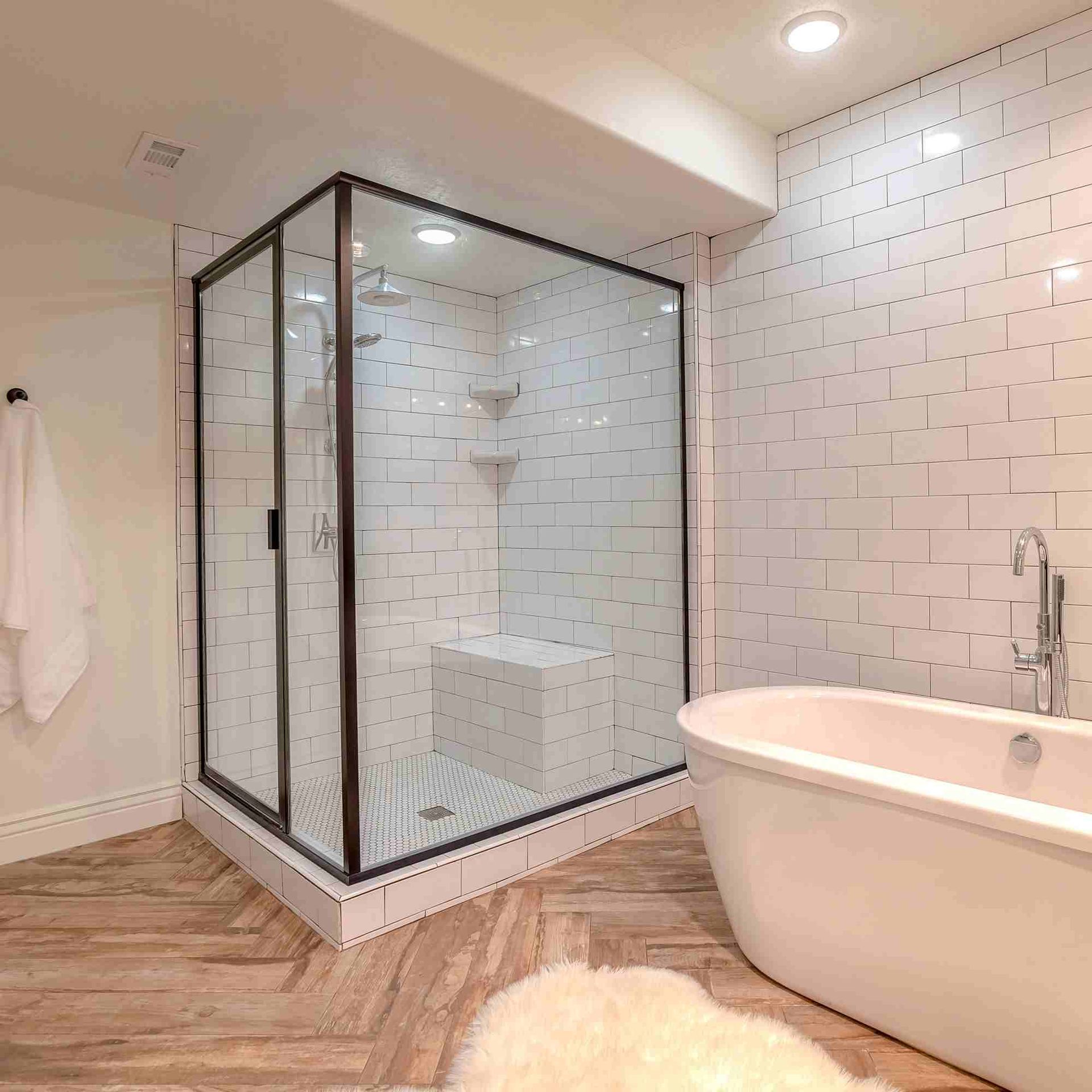 A shower in new bathroom with nice enclosure