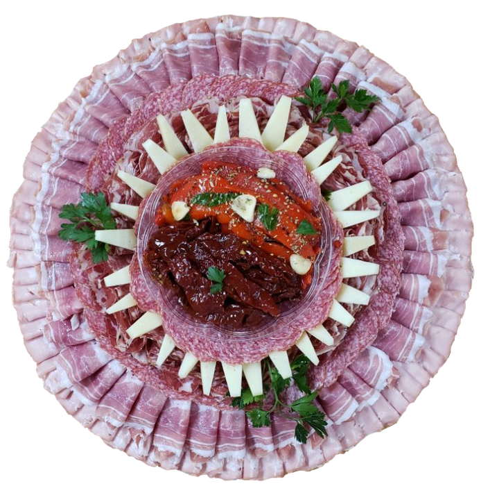 A plate of food with meat and cheese on it