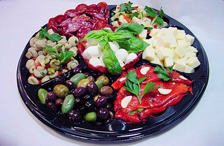 A black tray filled with different types of food
