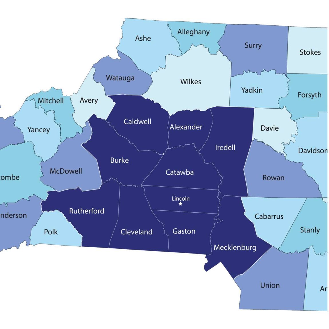 County map of a region in blue shades, with labeled counties and dark central counties highlighted
