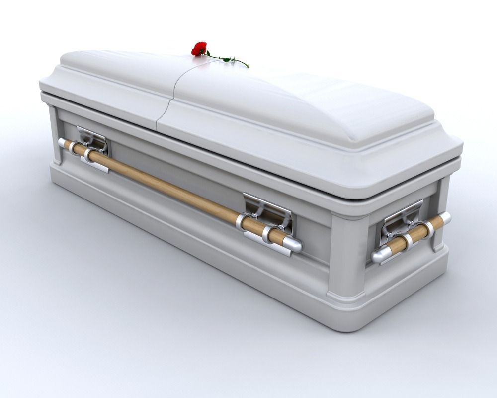White coffin with gold accents and a red rose on top, shown on a plain background