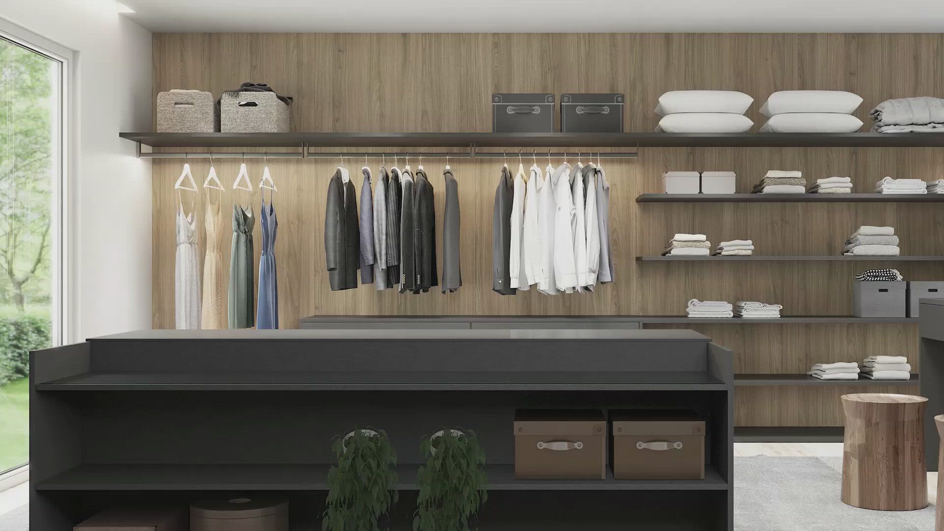 Un vestidor con ropa colgada en la pared y estantes.