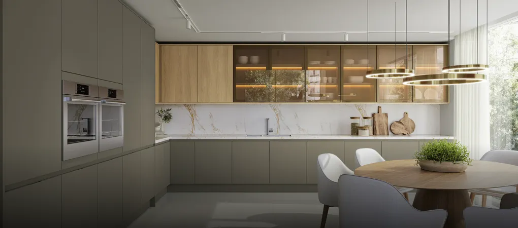 Cocina moderna minimalista con gabinetes de madera, salpicadero de mármol, isla y mesa de comedor.